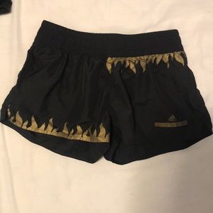 Adidas black and gold shorts